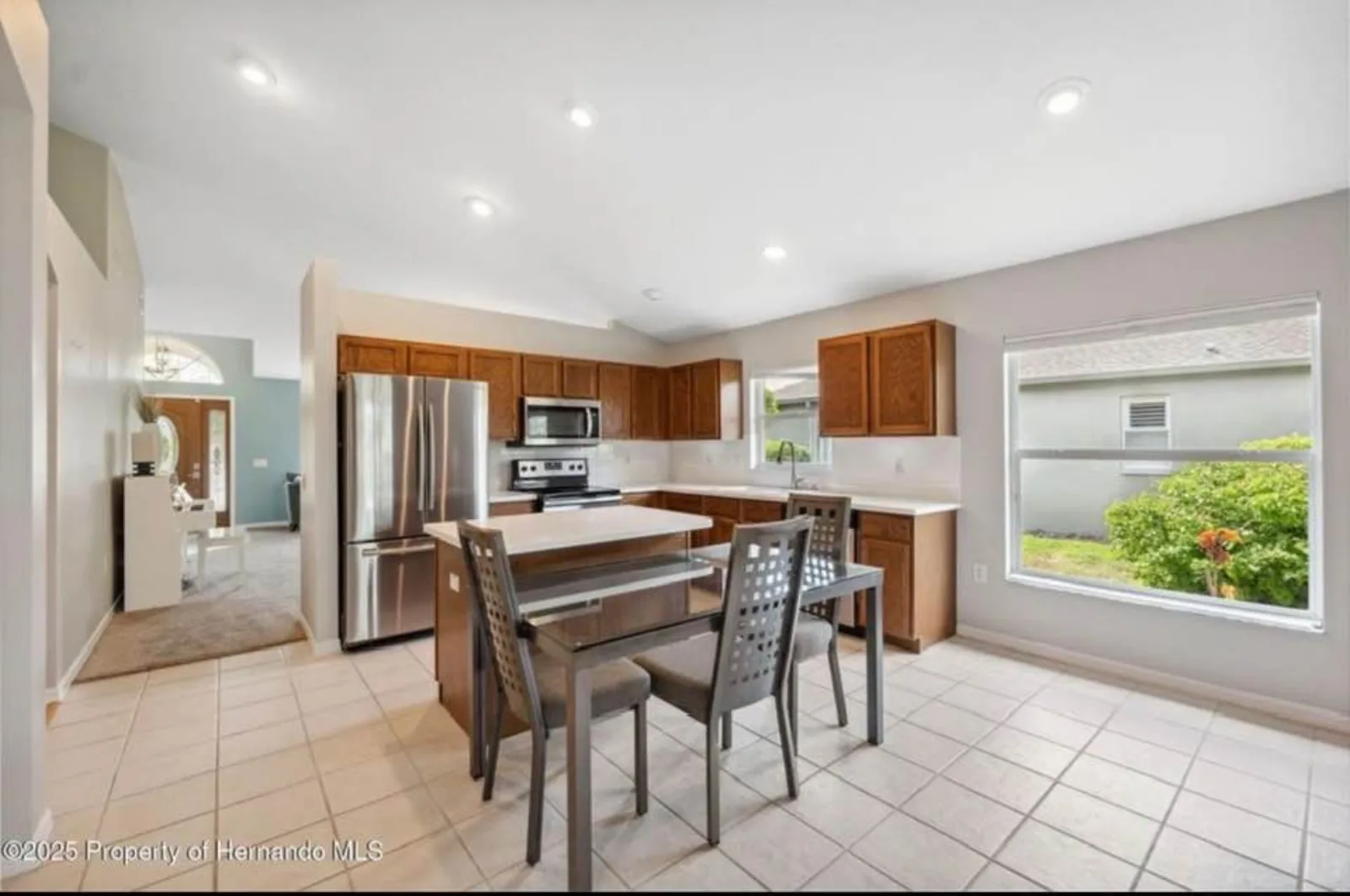 Original brown oak kitchen prior to Cabinet Design Studio remodel